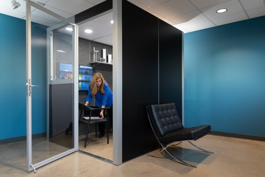 woman organizing YOURspace office pods