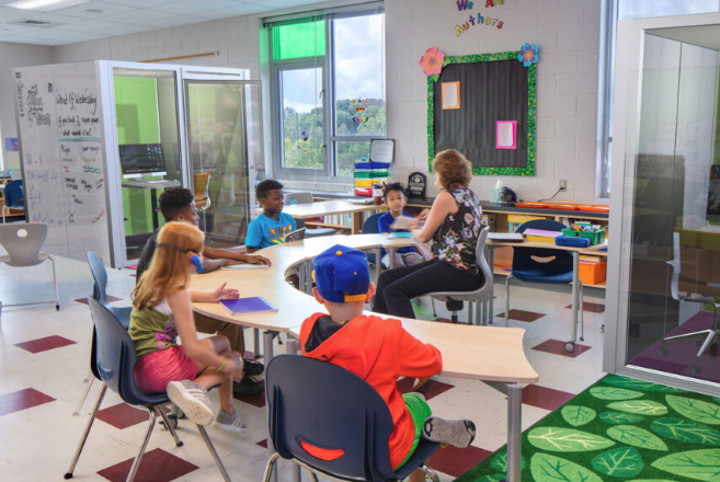 students learning in classroom with study pods