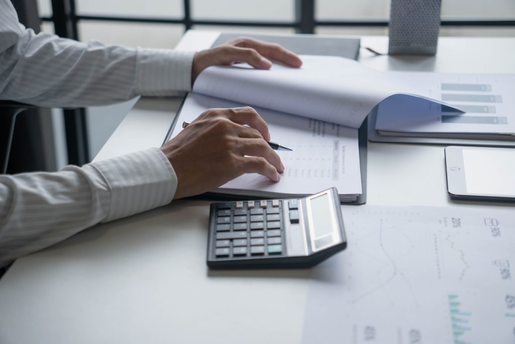 hands holding financial document